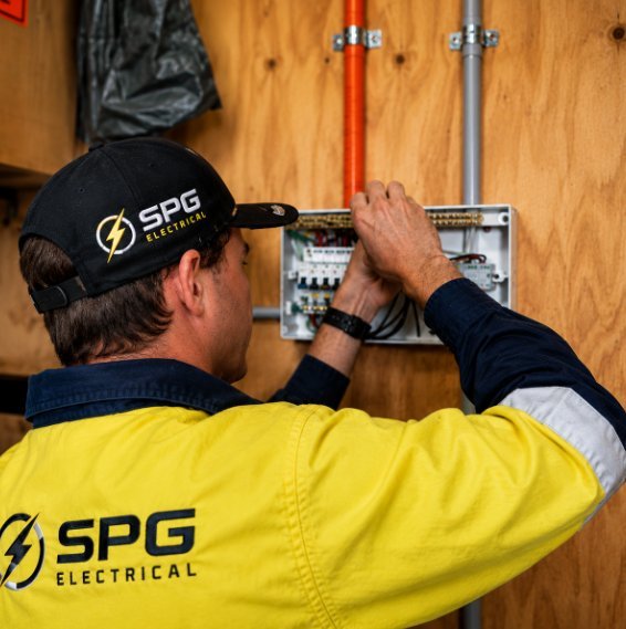 SPG Electrical technician servicing a residential switchboard